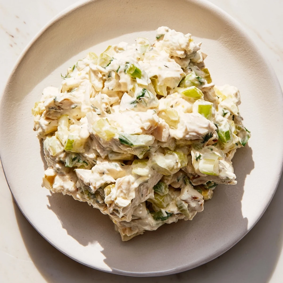Lump crab meat folded into zesty remoulade sauce, ideal for spreading on sandwiches or as a dip with crackers.