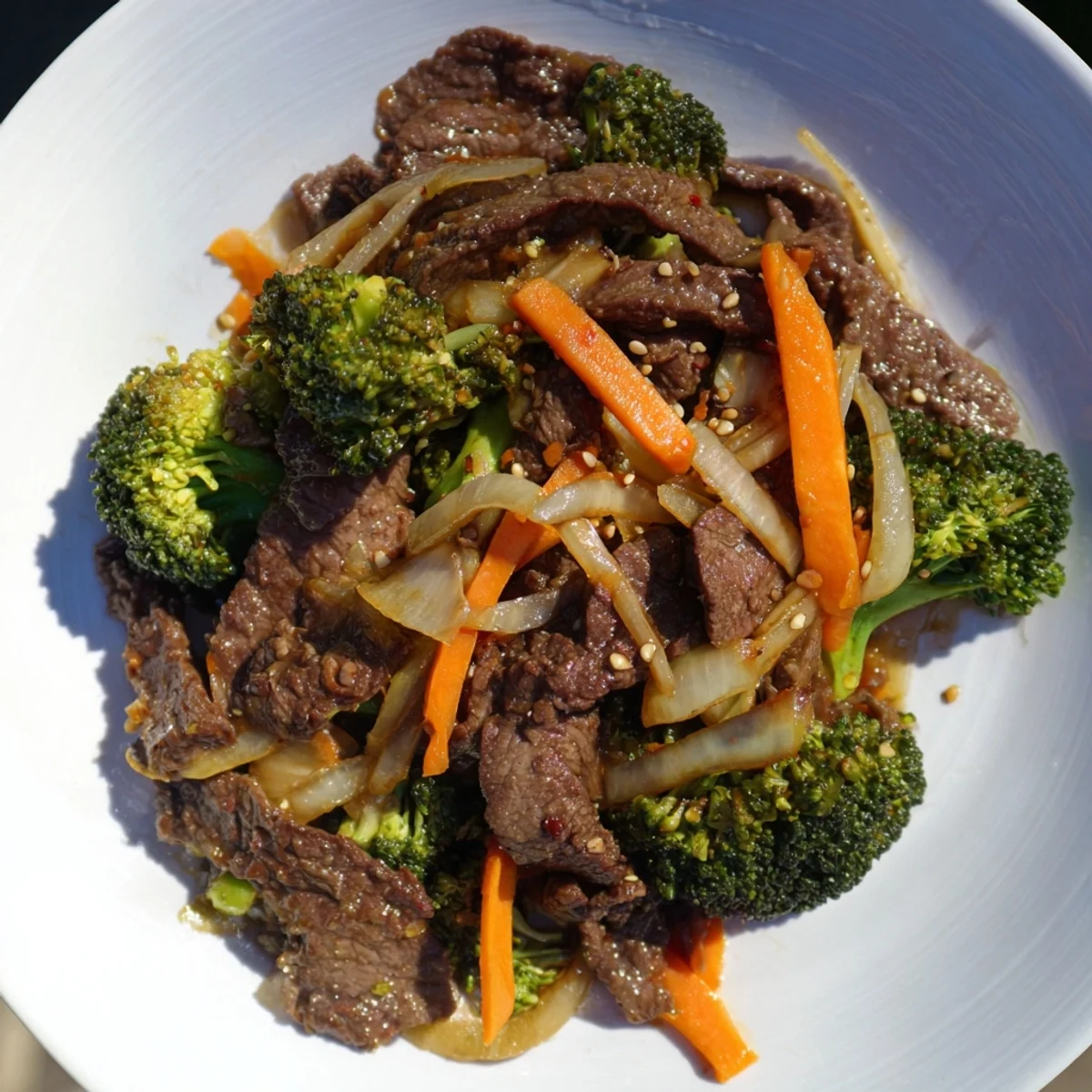 Tender beef and bright broccoli florets in a glossy ginger soy sauce stir fry.