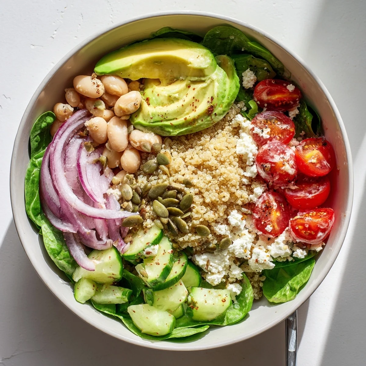 Serve this Spinach & White Bean Ultimate Protein Power Bowl with a lemon-tahini drizzle for a vibrant, protein-packed meal.