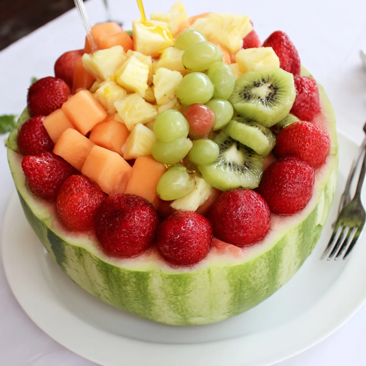 Watermelon Basket overflowing with colorful fruit, chilled and ready for picnics