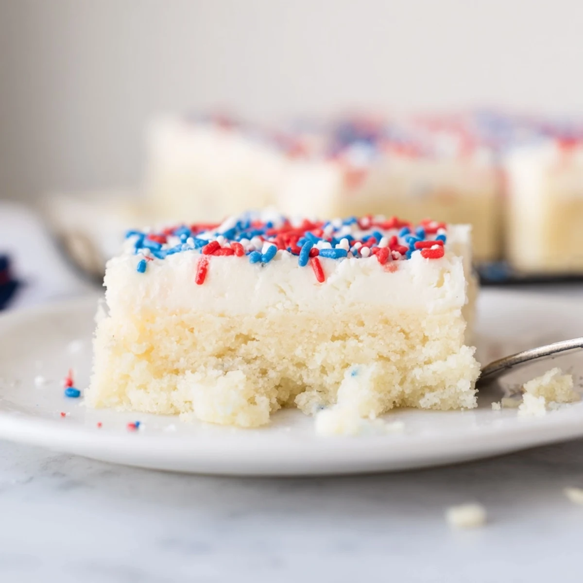 Warm 4th Of July Sugar Cookie Bars Recipe, soft buttery center, perfect picnic treat
